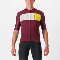 Vibrant Castelli Prologo 7 Jersey in a comfortable stretch fit, featuring raw-cut sleeves and reflective pocket details.