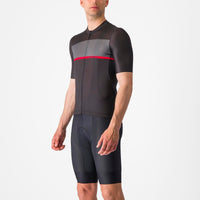 Vibrant Castelli Tradizione Jersey in a classic graphic design, showcasing breathable Strada micromesh fabric and a sleek fit for cycling comfort.