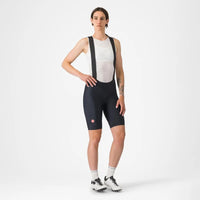 Women's Castelli Espresso W DT Bibshort in black, showcasing a tailored fit, mesh straps, and reflective tabs for visibility.