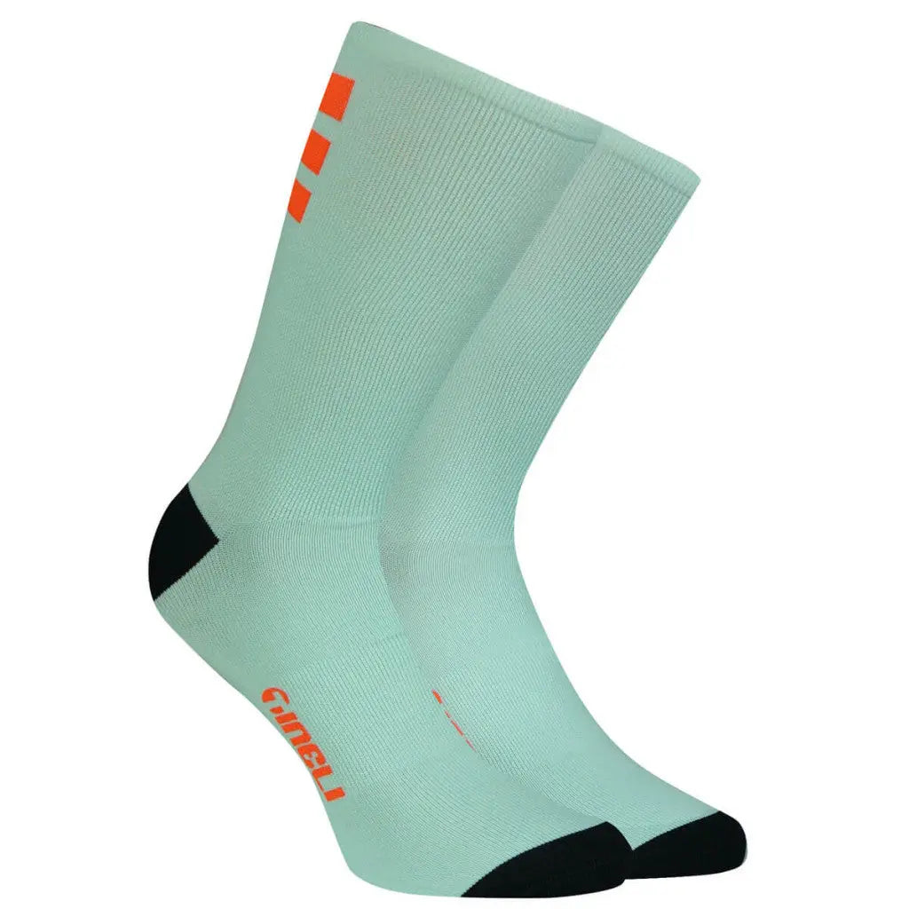 Stylish Tribeca Socks in vibrant colors, featuring mesh ventilation and a cycle-specific fit for ultimate comfort on rides.