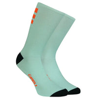 Stylish Tribeca Socks in vibrant colors, featuring mesh ventilation and a cycle-specific fit for ultimate comfort on rides.