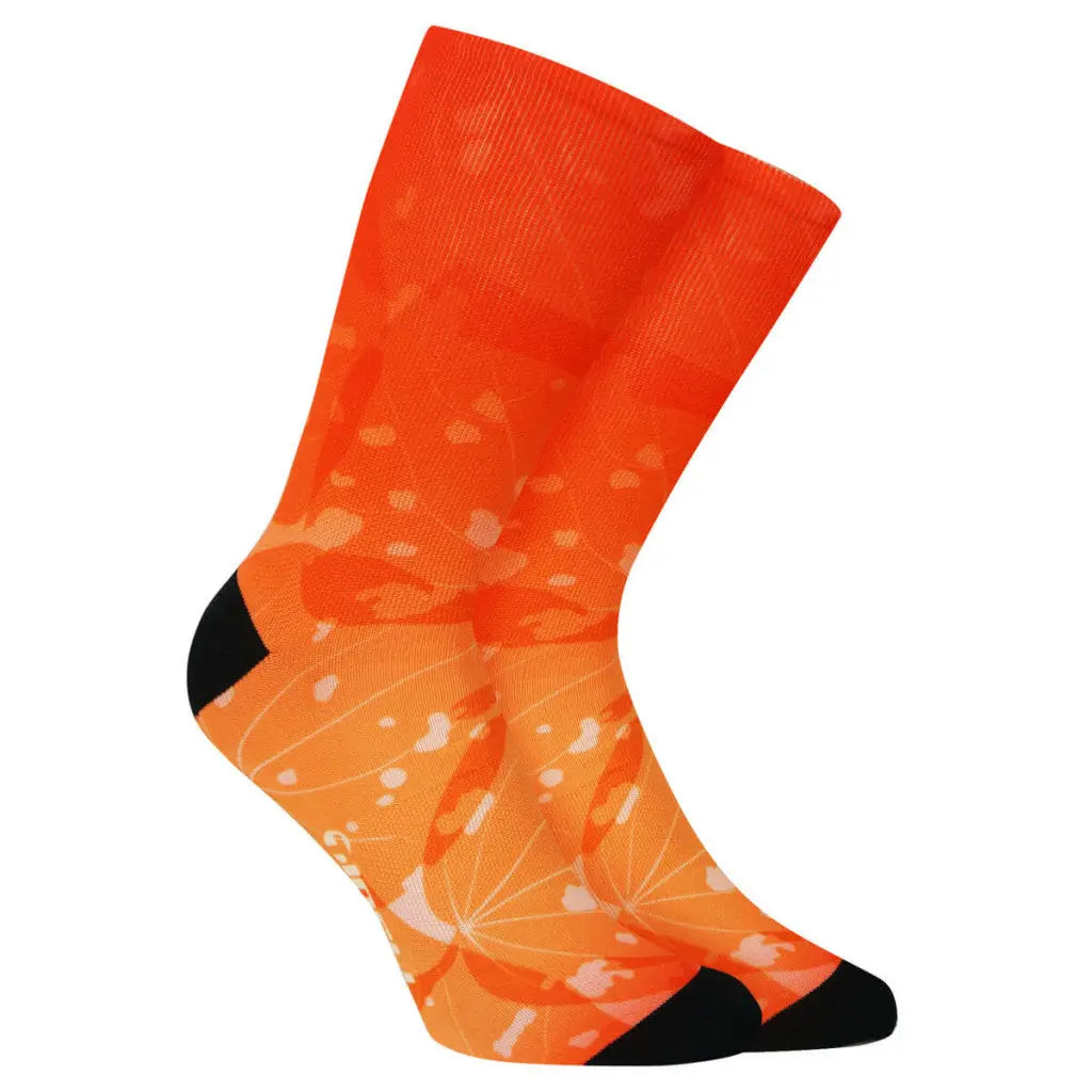 Vibrant Kaleidoscope Socks with a colorful, dynamic pattern, designed for road cycling with breathable mesh ventilation.