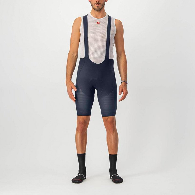Sleek black Castelli Superleggera Bibshorts with ultralight gradient fabric, minimalist mesh bibs, and embossed logos for a premium, high-performance look.