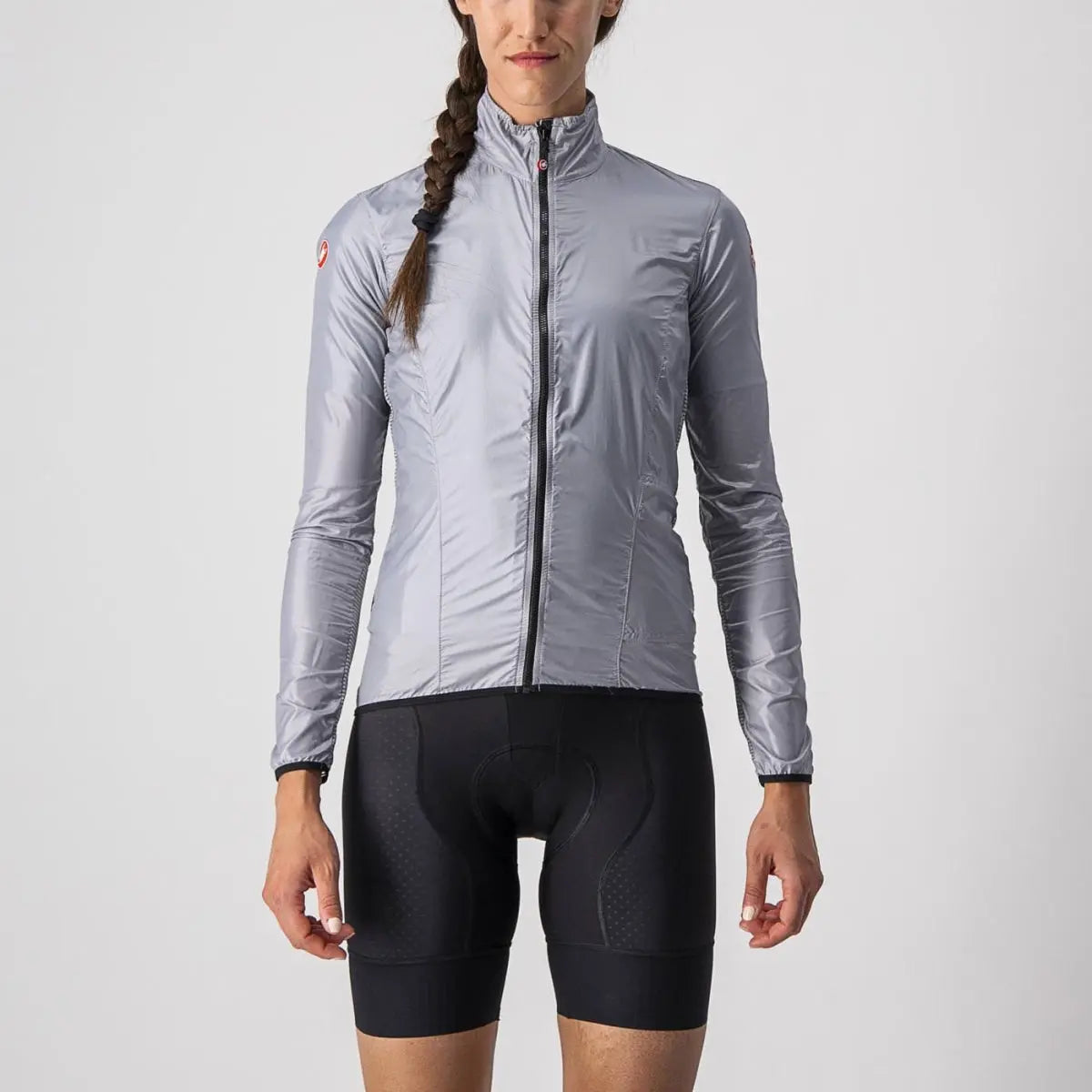 Lightweight Castelli Aria Shell Jacket for women, featuring a sleek windproof front and breathable mesh side panels.
