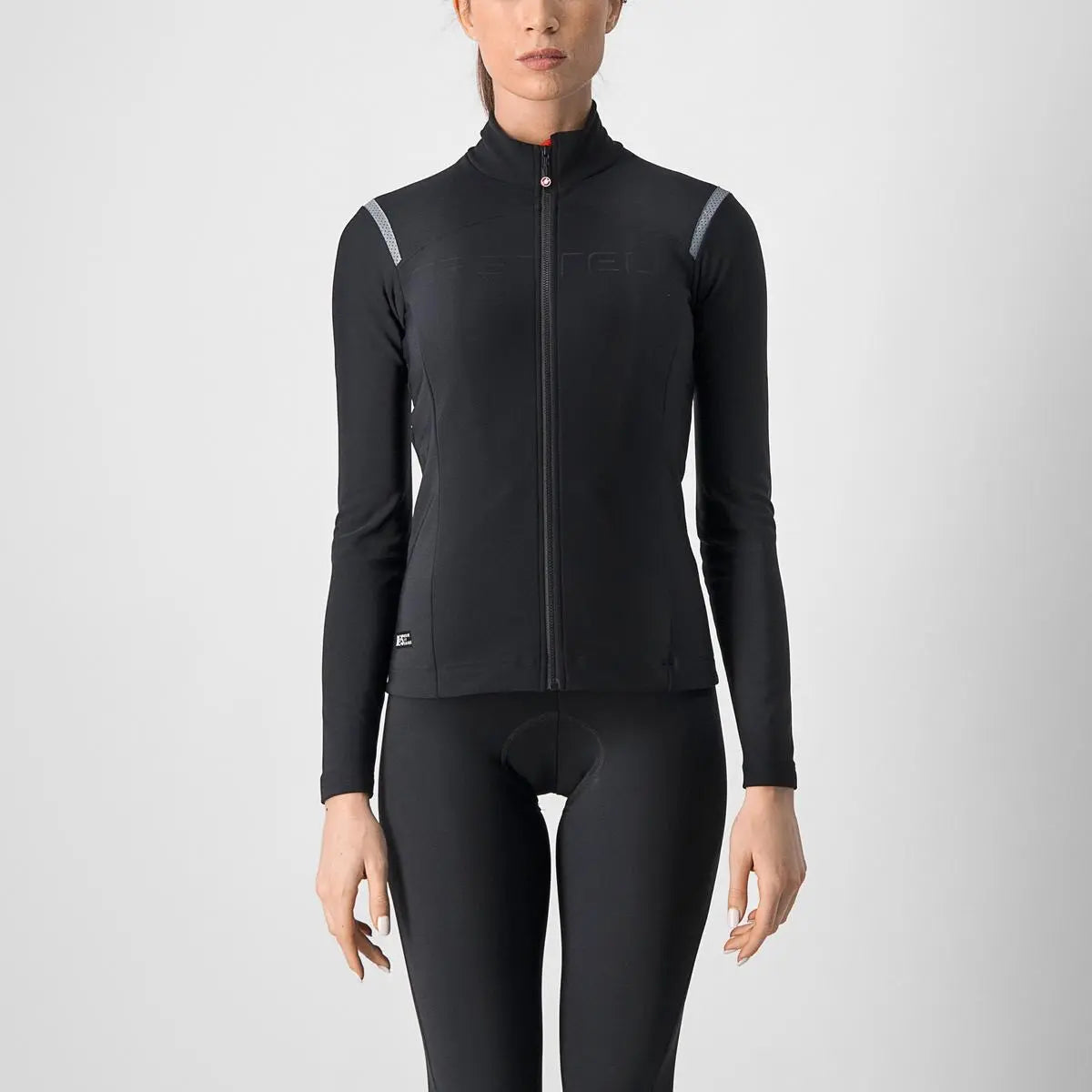 Women's Castelli Tutto Nano RoS Jersey in a sleek, form-fitting design with reflective shoulder panels for cool-weather cycling.