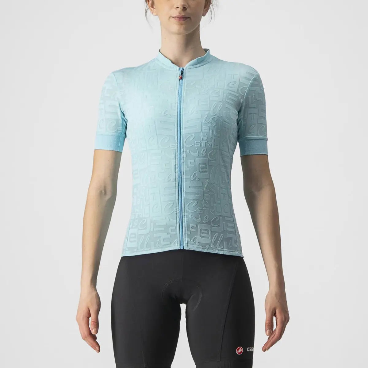 Vibrant women's Castelli Promessa Jacquard Jersey with intricate fabric design, reflective piping, and a sleek, comfortable fit.