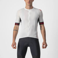 Vibrant Castelli Entrata VI Jersey in a sleek design, featuring breathable Air Mesh sleeves and a snug silicone grip waistband.