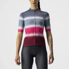 Vibrant women’s Castelli Dolce Jersey with a stylish gradient fade design, showcasing a snug fit and breathable fabric.