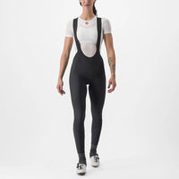 Cozy women's Castelli Velocissima DT Bibtights in black, featuring reflective leg bands and ankle zippers for winter rides.