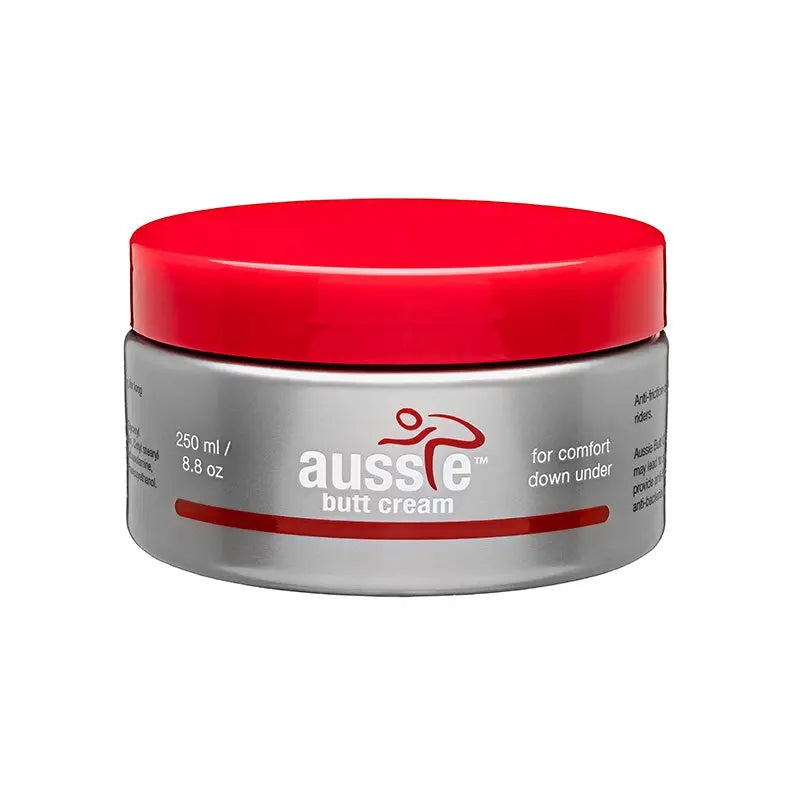 Jar of Aussie Butt Cream 250ml, a natural anti-friction chamois cream from Australia, featuring a clean, white container with bold text.