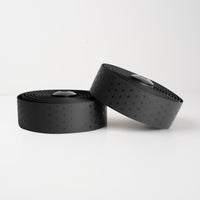 Sleek black BURGH Bar Tape Addition Stealth with bold, repeating addition symbols for a striking, structured look.