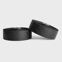 Sleek black BURGH Bar Tape Nexus Stealth with a glossy intricate pattern, designed for superior grip and comfort on any ride.