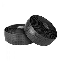 Sleek black BURGH 'X' Stealth bar tape with a glossy Spot UV print that subtly shines under light, exuding stealthy style.