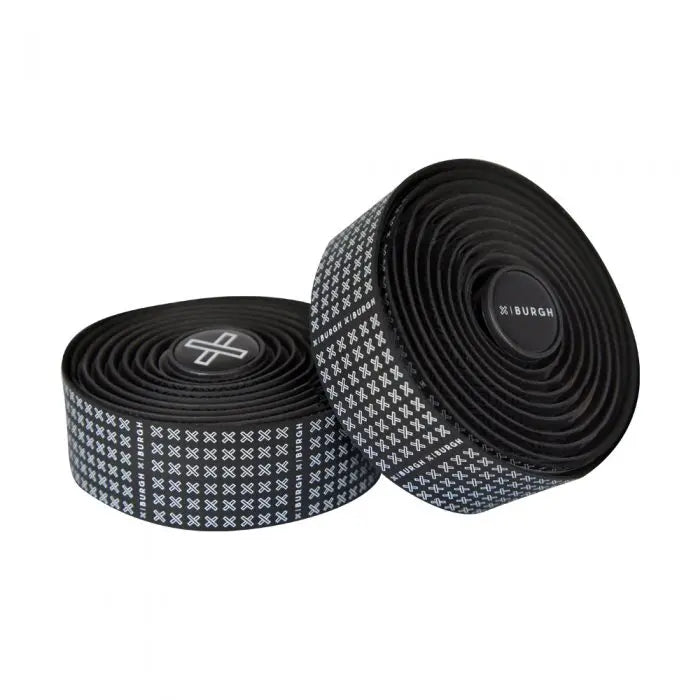 Sle, check out this sleek BURGH Bar Tape X in white, featuring a striking white-on-black repetitive pattern for a classic, structured look on your bike handlebars!
