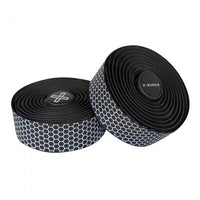 White Burgh Hex Bar Tape with a honeycomb pattern, showcasing a glossy finish and black base for stylish bike handlebars.