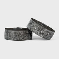 Stylish white Burgh Ossa Bar Tape with a unique topographic map pattern and signature X’s, designed for all-weather grip.