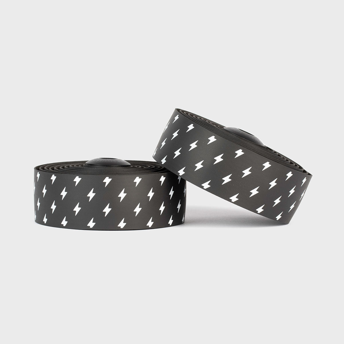 Vibrant white Burgh Lightning Bar Tape with bold black accents, designed for all-weather grip and stylish bike handlebars.