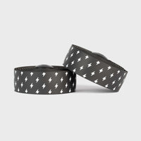 Vibrant white Burgh Lightning Bar Tape with bold black accents, designed for all-weather grip and stylish bike handlebars.