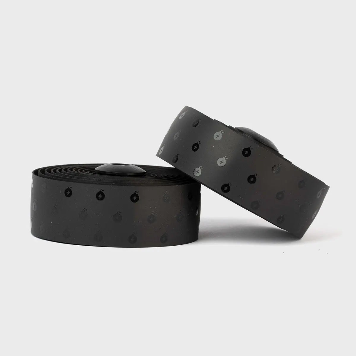 Sleek black BURGH Wattbombs Stealth Bar Tape with a glossy finish, offering a grippy, stylish grip for all-weather cycling.