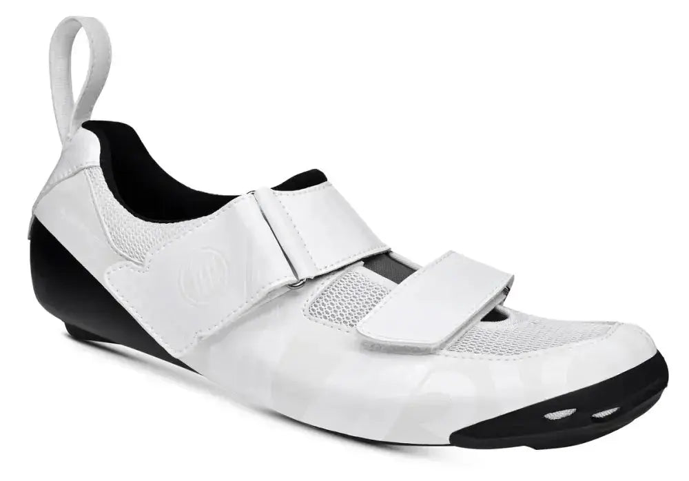 Sleek Bont Riot TR+ triathlon shoe in black and white, showcasing a carbon composite design with Velcro straps for quick transitions.