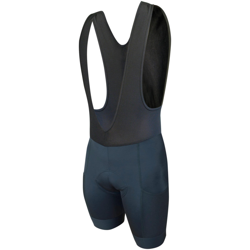 Women's Core Cargo Bibs showcasing multi-pocketed design with deep leg pockets and a spacious back pocket for adventure.