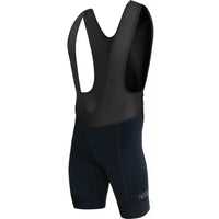 Men's black core bibs with a snug 6 cm elite gripper legband, supportive 240gsm lycra, and elastic mesh shoulder straps.