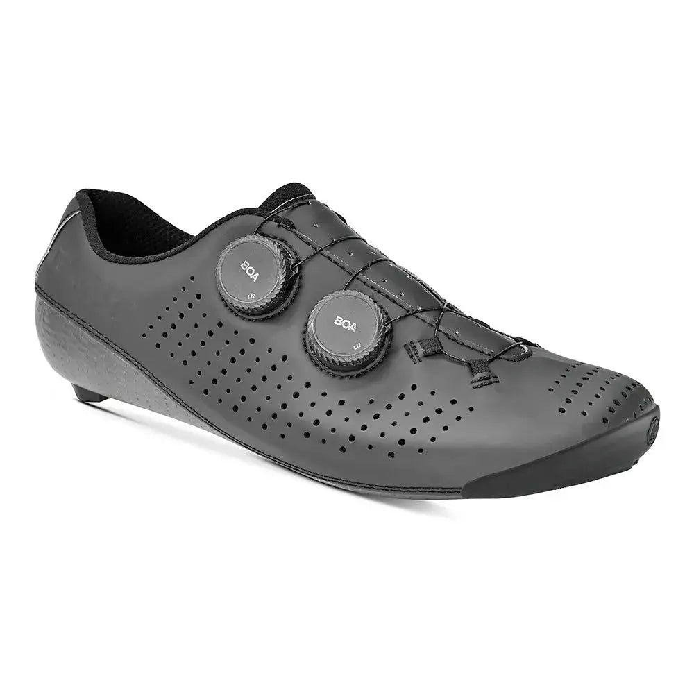 Sleek Bont Vaypor 23 cycling shoe in black and white, showcasing a lightweight carbon fiber design and dual BOA dials for a precision fit.