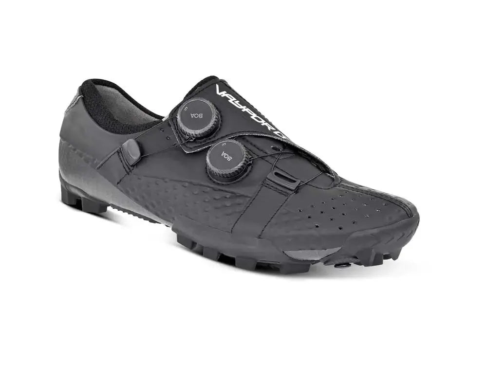 Sleek black Bont Vaypor G Li2 cycling shoe in wide fit, showcasing a durable carbon chassis and precise BOA Li2 dials.